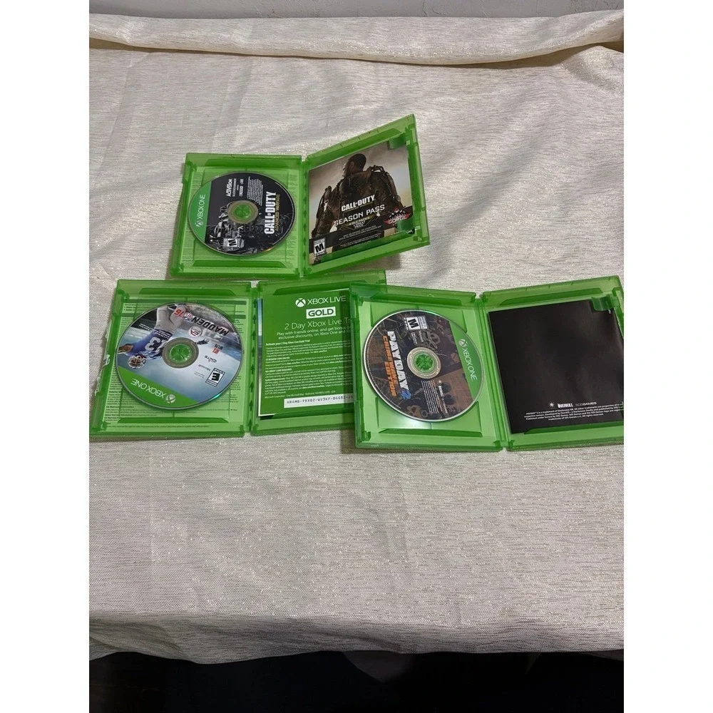 three Xbox One video games Payday, call of duty ,madden